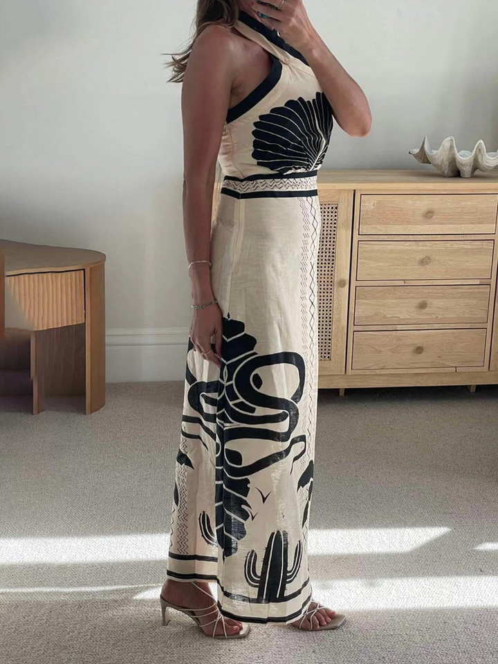 Vestido largo ajustado con estampado étnico y escote cruzado elegante