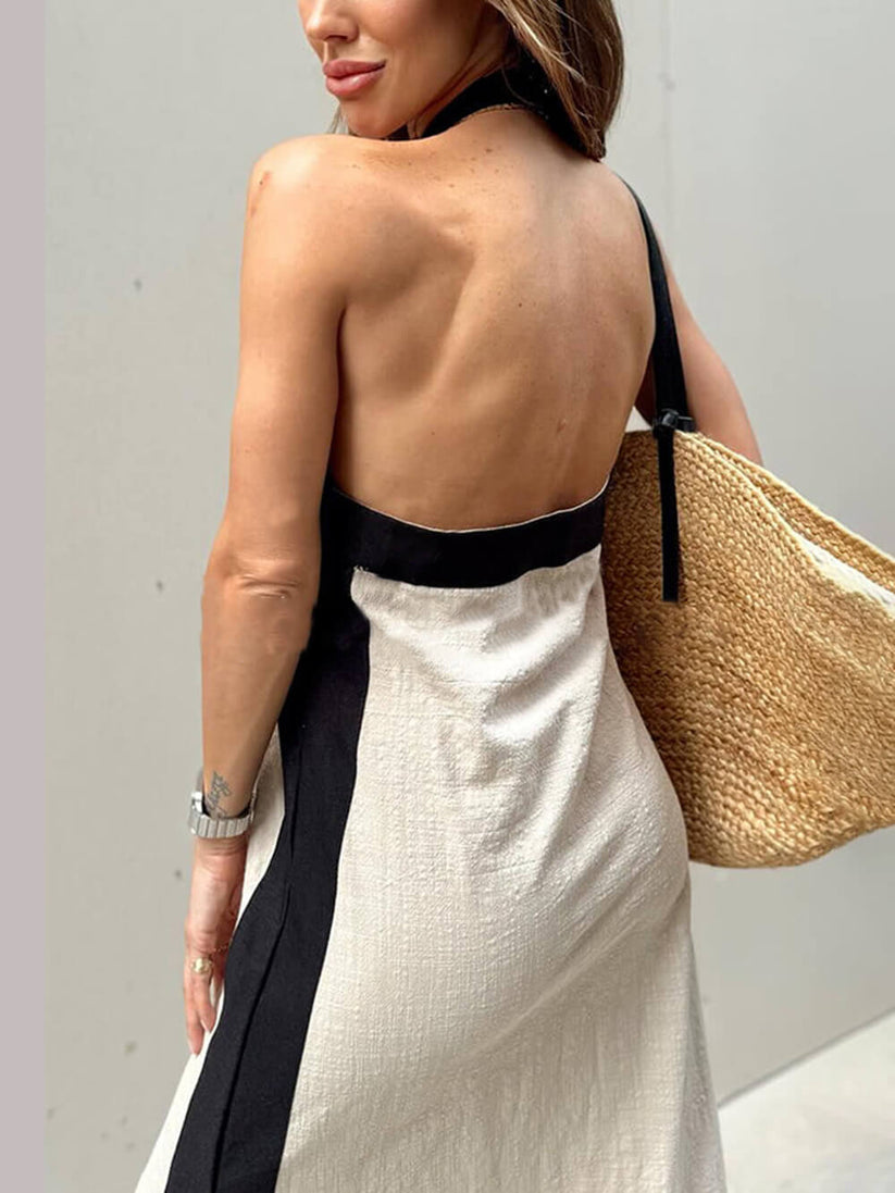 Vestido largo bicolor con escote cruzado y detalle de abertura